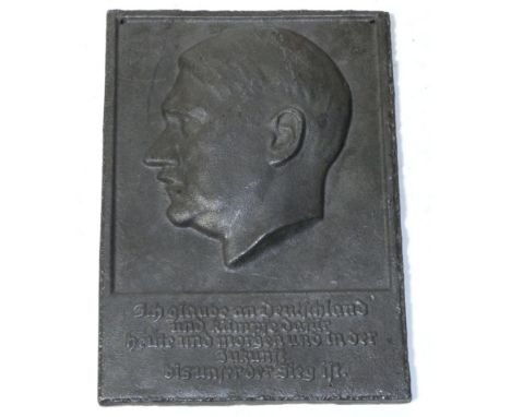 A Rectangular Cast Lead Plaque Bearing a Relief Portrait of Adolf Hitler, and inscribed, ''Ich glaube an deutschland und kamp