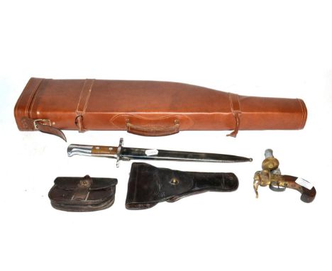 Militaria, comprising:- a US leather pistol holster by Walsh, dated (19)44; a leather ammunition pouch; a Swiss K31 bayonet, 