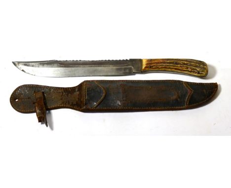 A 19th Century Bowie Knife, the 26.5cm single edge saw back clip point steel blade stamped with a tree logo for H.Boker & Co.