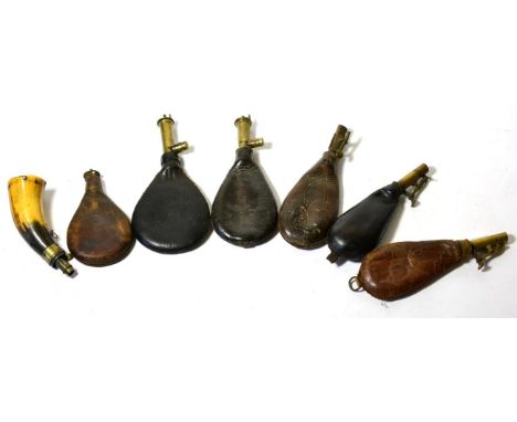 An Early 19th Century Horn Powder Flask, with brass charger and external steel spring; six Various Stitched Leather Shot Flas