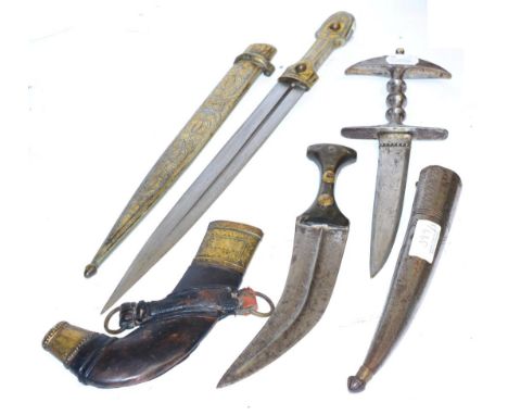 A Russian Kindjal, the 32.5 cm blade with single fuller, niello and gilt hilt, conforming scabbard, 20th century, together wi