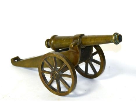 A 20th Century Brass Model of a Cannon, with 17.8 cm  barrel, turned cascabel and circular section trunnions, on conforming c