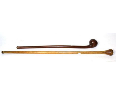 A Zulu Knobkerrie, of rich chestnut coloured wood, with offset globular head and tapering haft, 60cm; an Oak Walking Stick, w