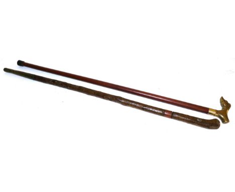 An Early 19th Century Hazel Swordstick, with single edge, fullered blade, length 66 cm, the grip pierced and mounted for a th