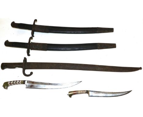 Three Bayonets, comprising a British 1856 Pattern example, the blade stamped ''Chavasse'' and numbered B78, and another simil