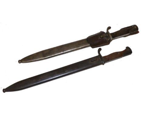 A German 98/05 Butcher Bayonet, second pattern, with saw back blade, the ricasso stamped WAFFENFABRIK MAUSER A.G. OBERNDORF, 