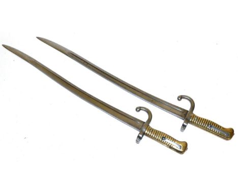 A French Model 1866 Chassepot Yataghan Bayonet, stamped, ''W.R. Kirschbaum'', and another, similar, numbered 4783A, the back 