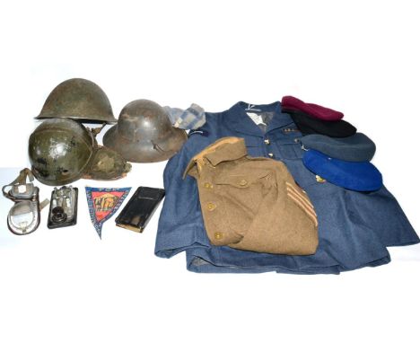 A Small Quantity of Uniforms and Helmets, including a Second World War despatch rider's helmet, a Brodie helmet, a turtle hel