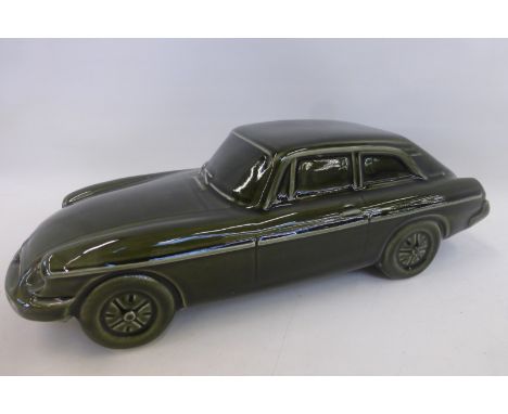 A large pottery model of an MGB.