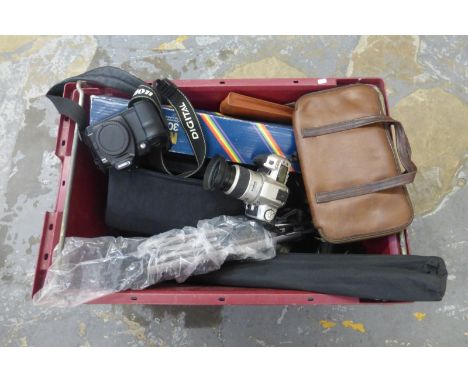 A large box of camera related equipment etc.