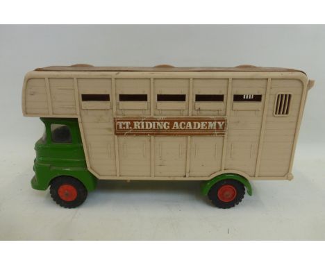 A Tri-ang tinplate and plastic model of a horsebox.