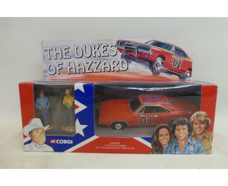 A boxed Corgi "Dukes of Hazzard" set comprising the General Lee with two scale model figures.