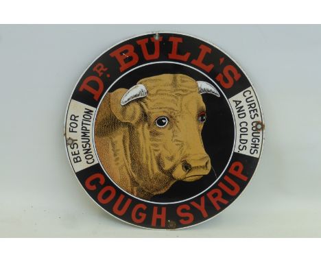 A reproduction Dr Bull's Cough Syrup circular pictorial enamel sign, 11 1/4" diameter.