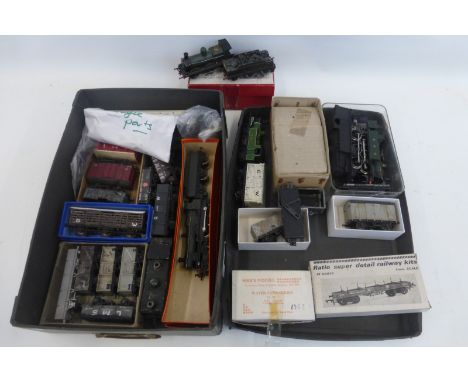 Two boxes of mostly unboxed 00 gauge model railway components, including locomotives, some partially built.