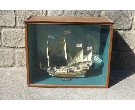 A model of a four masted ship, the Revenge, of 1577, set within a glass fronted wooden case; by repute originally on display 