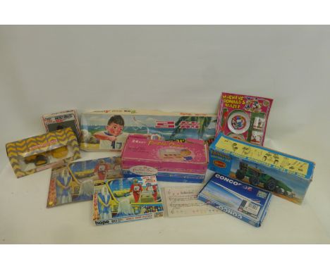 A selection of boxed toys including a Chinese "Bow and Arrow", Space 1999 puzzle, complete and a boxed Micky Mouse Radio etc.