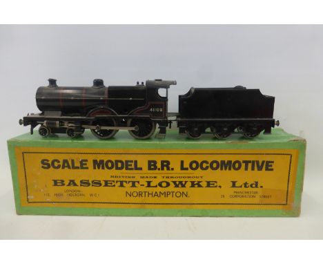 A Bassett-Lowke scale model of a B.R. locomotive and tender, "B.R. Compound Loco.Electric" in excellent condition.