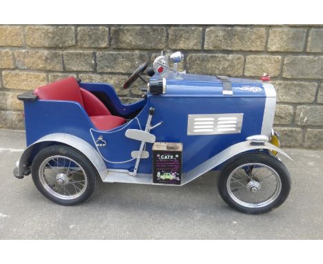 A well constructed pedal car in the form of a pre-war Vauxhall open tourer.