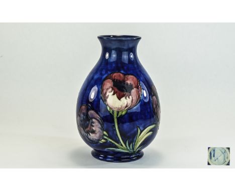 William Moorcroft Signed Large and Ovoid Shaped Vase ' Big Poppy ' Design. Signed to Underside of Vase. Height 9.5 Inches.