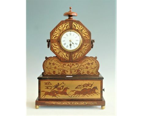A mid-19th century rosewood and brass inlaid mantel clock, known 'The Courier of St Petersburg' mantelpiece clock, having con