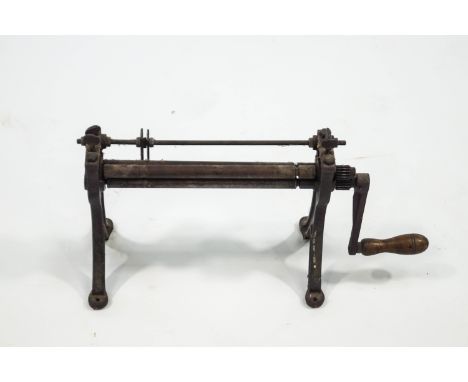 An antique sheet metal roller, 51cm wide