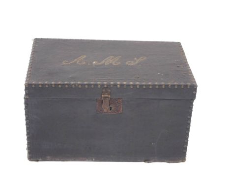 A small canvas travelling trunk, with brass studding and initials, 69cm wide