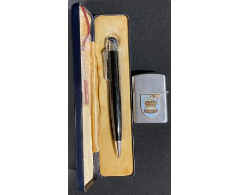 A Ronson novelty pen lighter, with box and papers; another, a Korea-Japan white metal lighter with applied Commonwealth ename