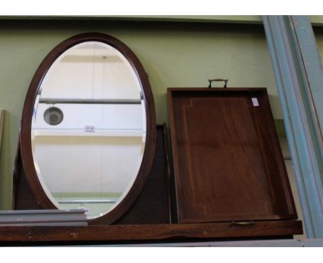 AN INLAID MAHOGANY FRAMED OVAL BEVEL PLATE WALL MIRROR together with two wooden trays 