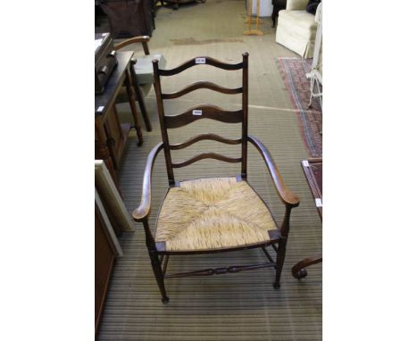 AN ARTS &amp; CRAFTS DESIGN LADDER BACK RUSH SEATED ARMCHAIR 