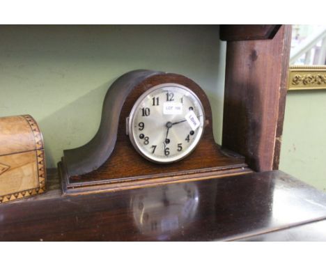 AN OAK NAPOLEON HAT MANTEL CLOCK 