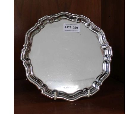 A HALLMARK SILVER CHIPPENDALE DESIGN SALVER 