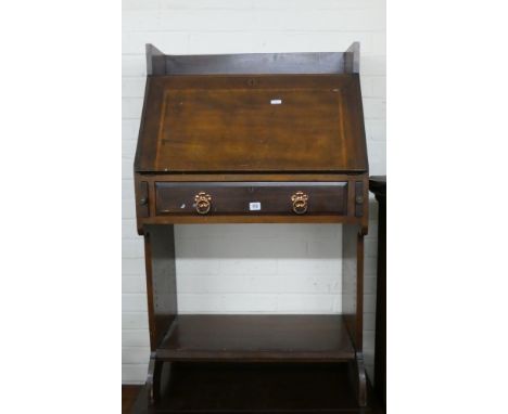 A 1920/30's students bureau with open shelf under 