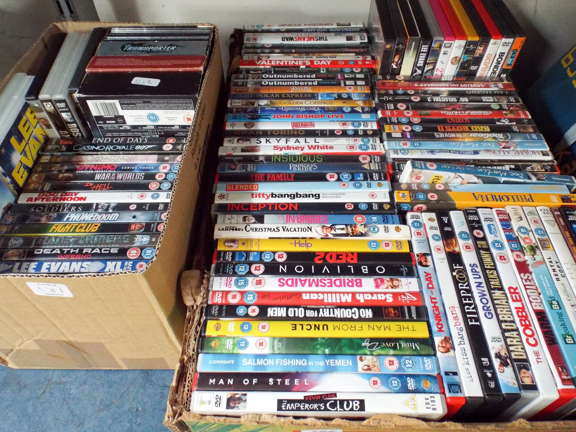 Two large boxes of DVD's