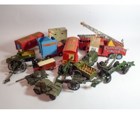 A collection of Corgi Major army trucks and a Chipperfields Circus played with condition