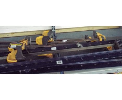 Three 4' long sash cramps and 6 large quick grip, quick release clamps 