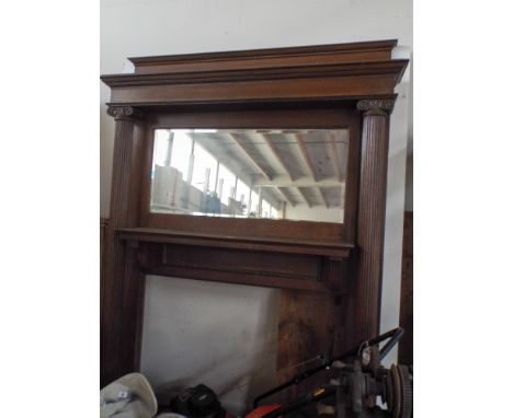 A very large oak Victorian style fire surround with mantel shelf, large mirror and large columns either side measuring 7' hig