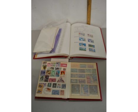 An album of stamps of the Cayman Islands (mainly lower values) together with various first day covers and a stock book of wor