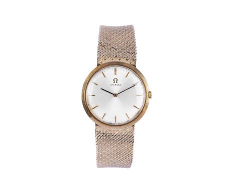 Omega: a 9ct yellow gold cased wristwatch, the silvered baton dial fitted 17-jewel manual wind movement, cal 620, no. 23429xx