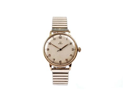 Omega: a gilt cased wristwatch, the Arabic dial with central seconds hand, fitted 17-jewel manual wind movement no.10852xxx, 