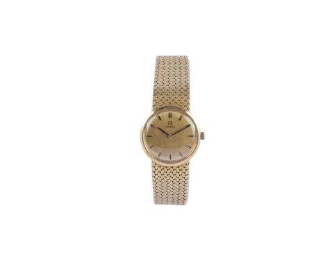 Omega: an 18ct yellow gold cased wristwatch, the gilt dial with baton hour markers, fitted a manual wind 17-jewel movement, c