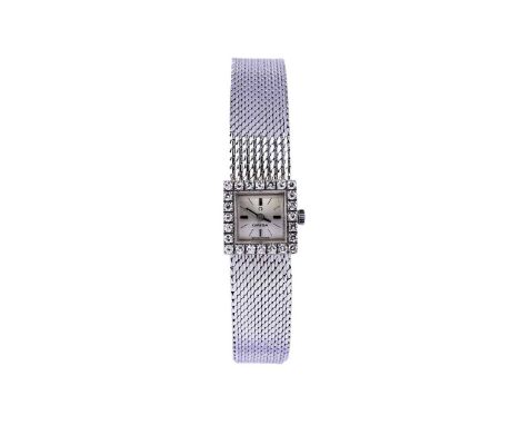 Omega: an 18ct white gold lady's cocktail watch, the silvered baton dial within diamond bezel, fitted 17-jewel manual wind mo