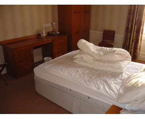 The bedroom contents of room 34, comprising of double door wardrobe, double bed, pair of bedside tables, dressing chest, lugg