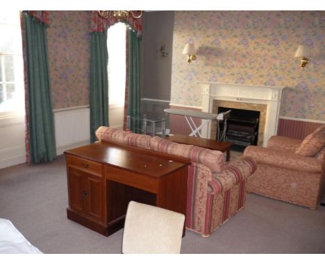 The part bedroom contents of room 32, comprising of two drawer luggage chest, bureau, Corby trouser press, Persian rug, coffe