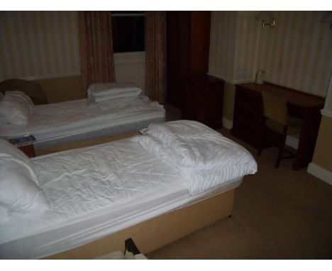 The bedroom contents of room 54, comprising of two drawer luggage stand, three chairs, dressing table, single door cabinet, d