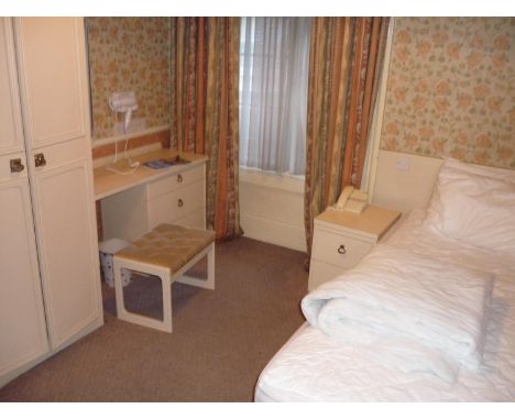 The bedroom contents of room 12, comprising of single bed, free standing bedside cabinet, dressing table stool, fixed wardrob