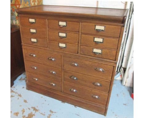 VINTAGE OFFICE CHEST, early 20th century globe Wernicke oak, in two sections with nine letter file drawers and six deep drawe