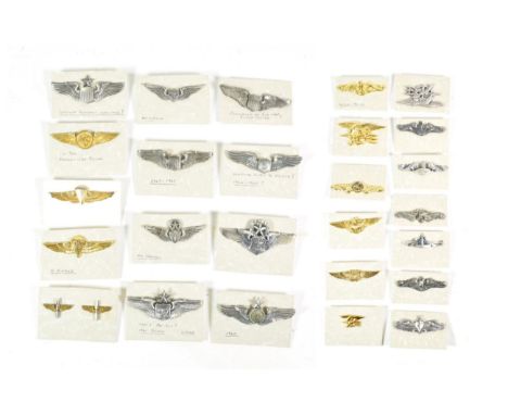 Twelve US Navy Breast Badges, to a Submarine officer, marked H24N; four Submarine enlisted men, one marked Vanguard; Submarin