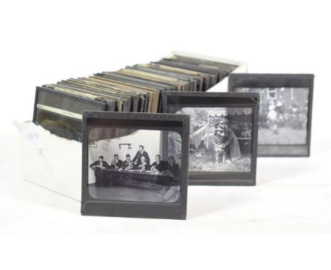 A Collection of Fifty Nine Magic Lantern Slides, military related themes including Victorian coloured printed battle scenes, 