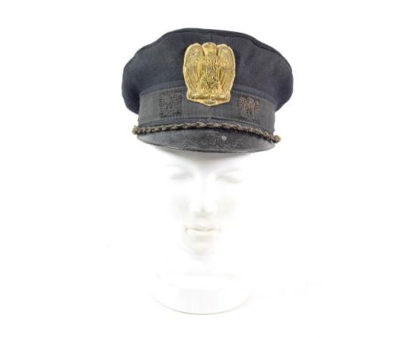 A Second World War Italian Fascist Officer's Black Wool Peaked Cap, the black gros grain centreband woven with the Italian ea
