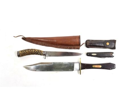 A 19th Century German Small Hunting Knife, the 13cm draw-back steel blade stamped M.WEISS, with steel down-turned crossguard,
